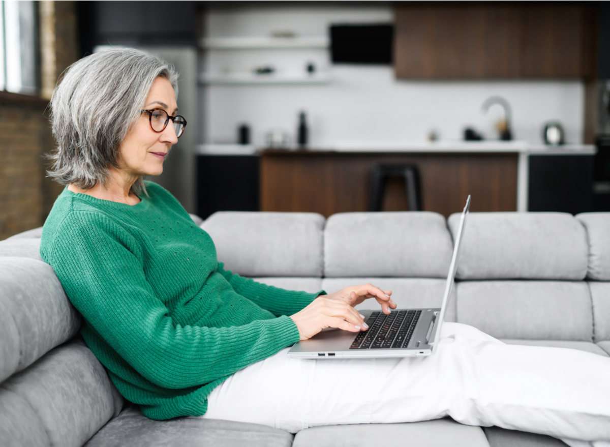 older woman using laptop