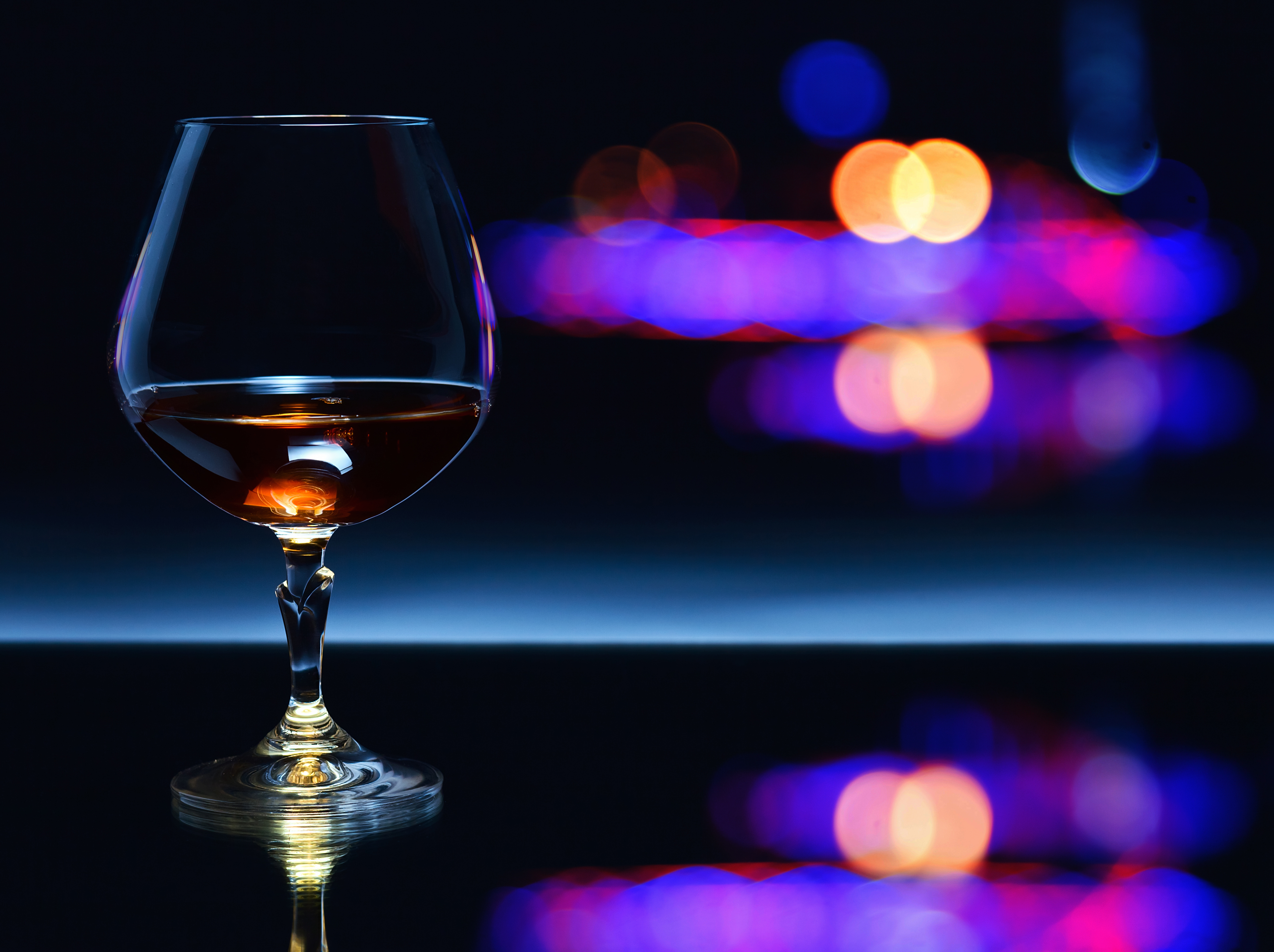 Snifter,With,Brandy,On,A,Dark,Background.