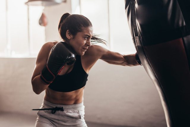 woman boxing in a gym