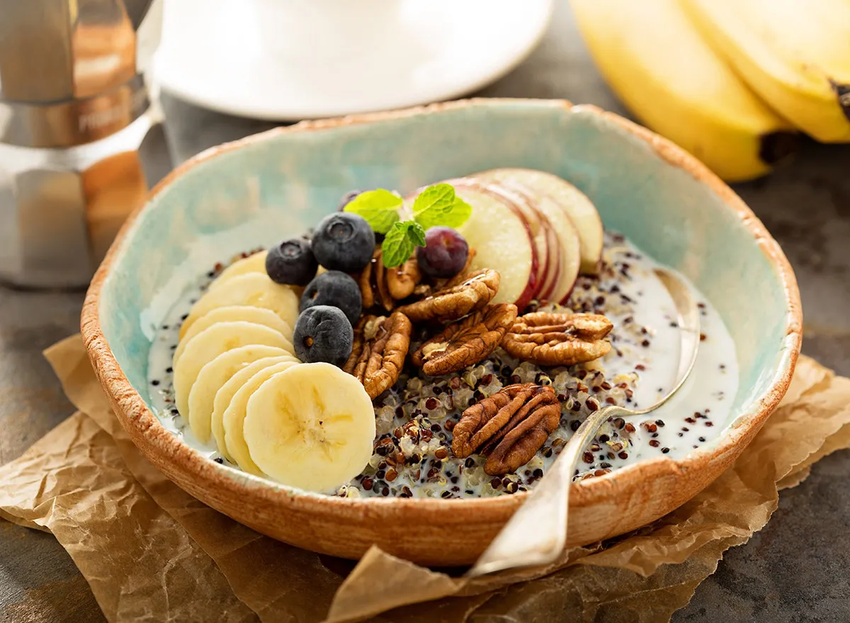 pecans in a breakfast bowl with quinoa and fruit