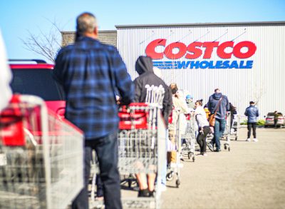 customers in line with carts outside costco