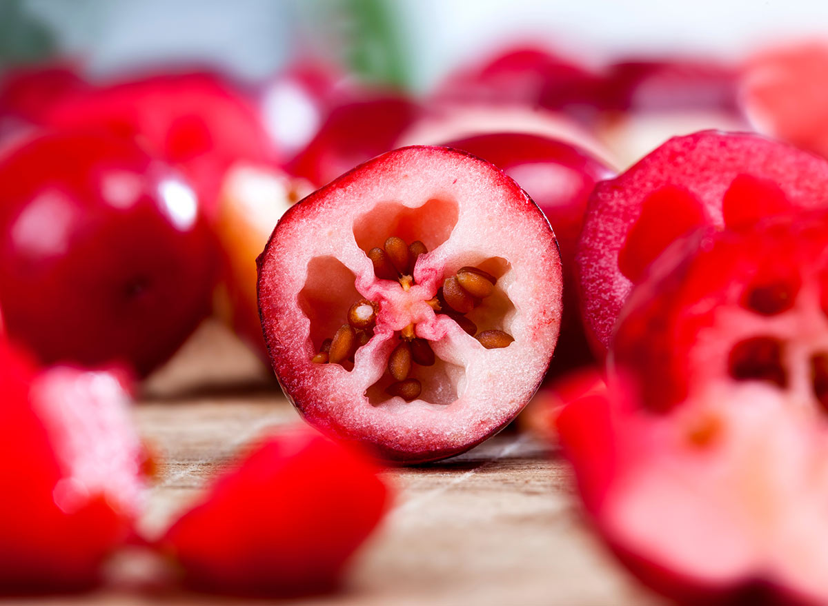 cut open cranberry with seeds