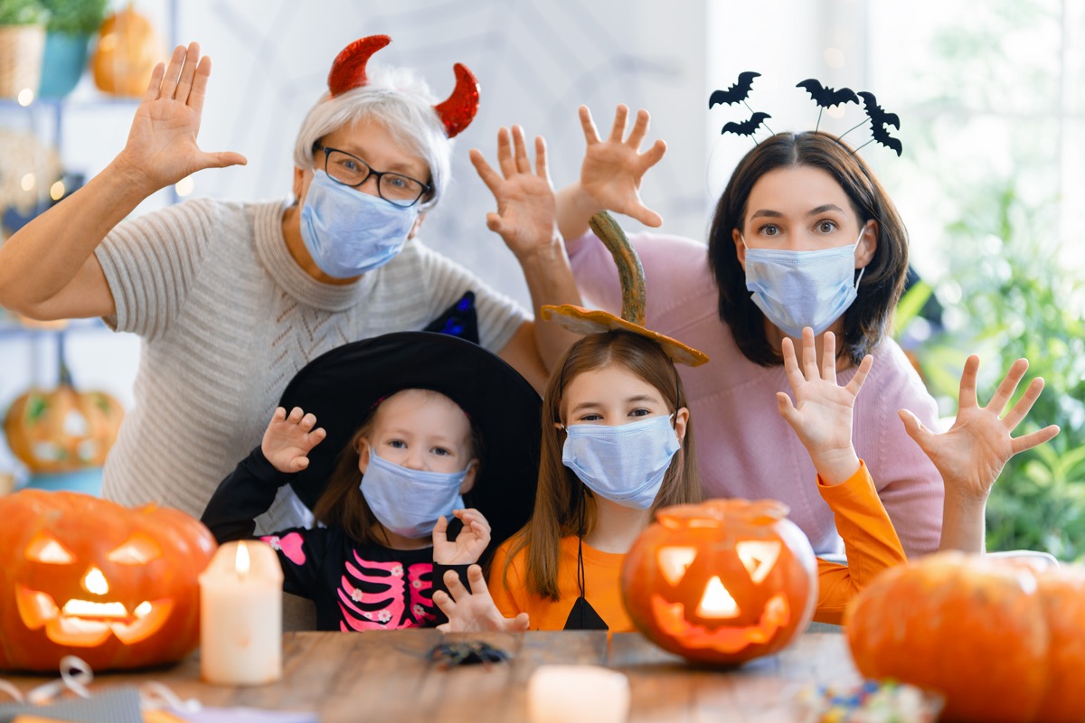 Happy family celebrating Halloween