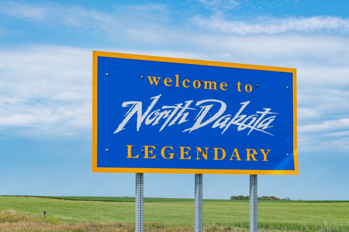 North Dakota welcome sign along the highway at the state border