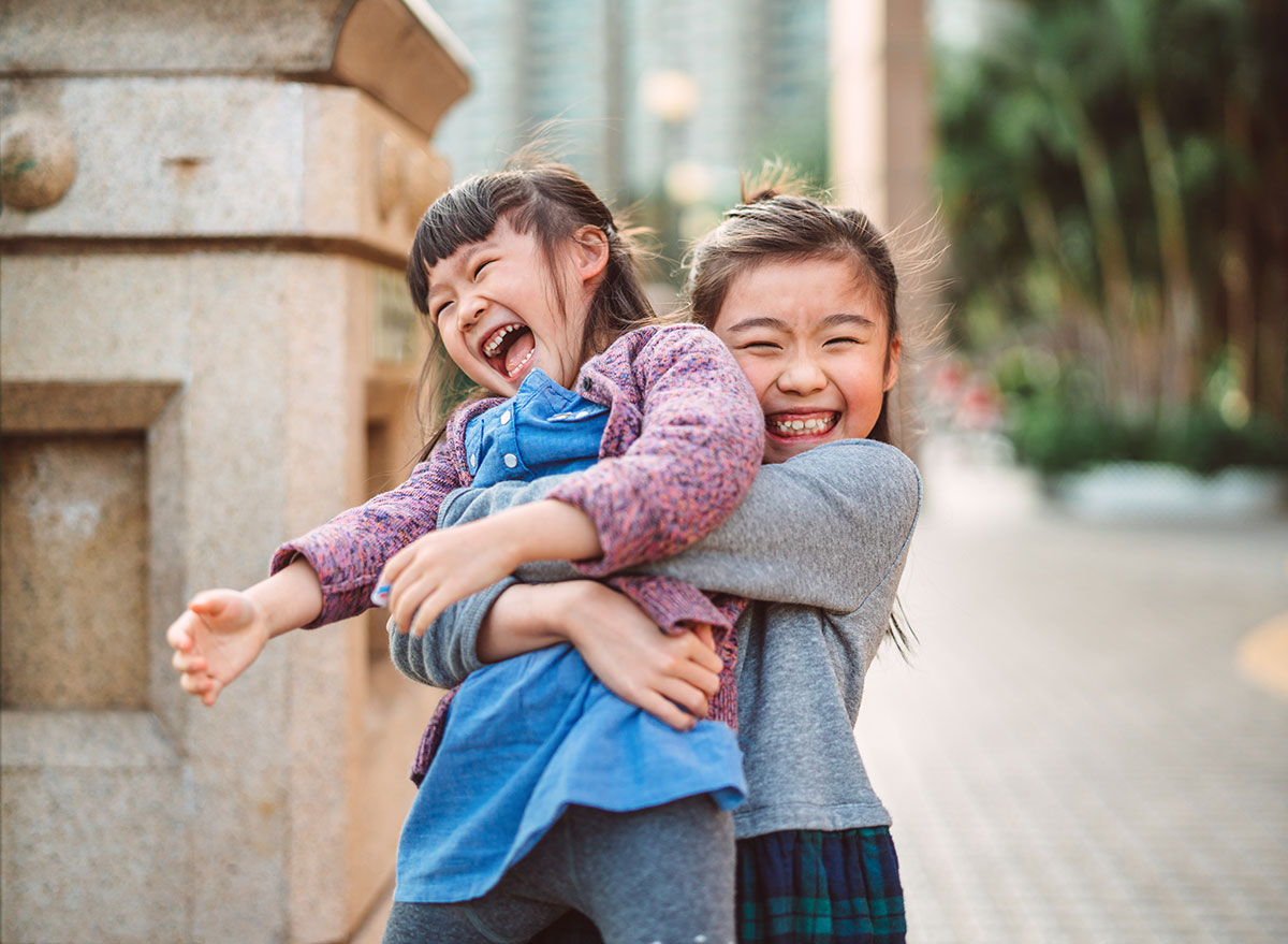 siblings playing