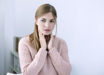 Woman With Sore Throat