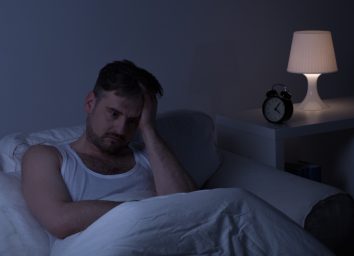 man awake in the middle of the night