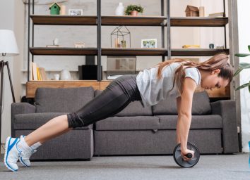 woman doing ab exercises at home