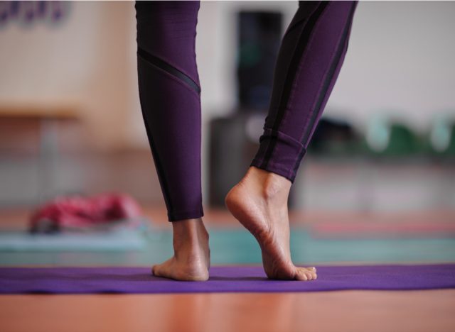 calf stretch during yoga class