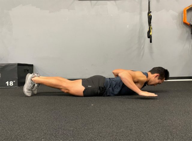 trainer performing hand release pushups