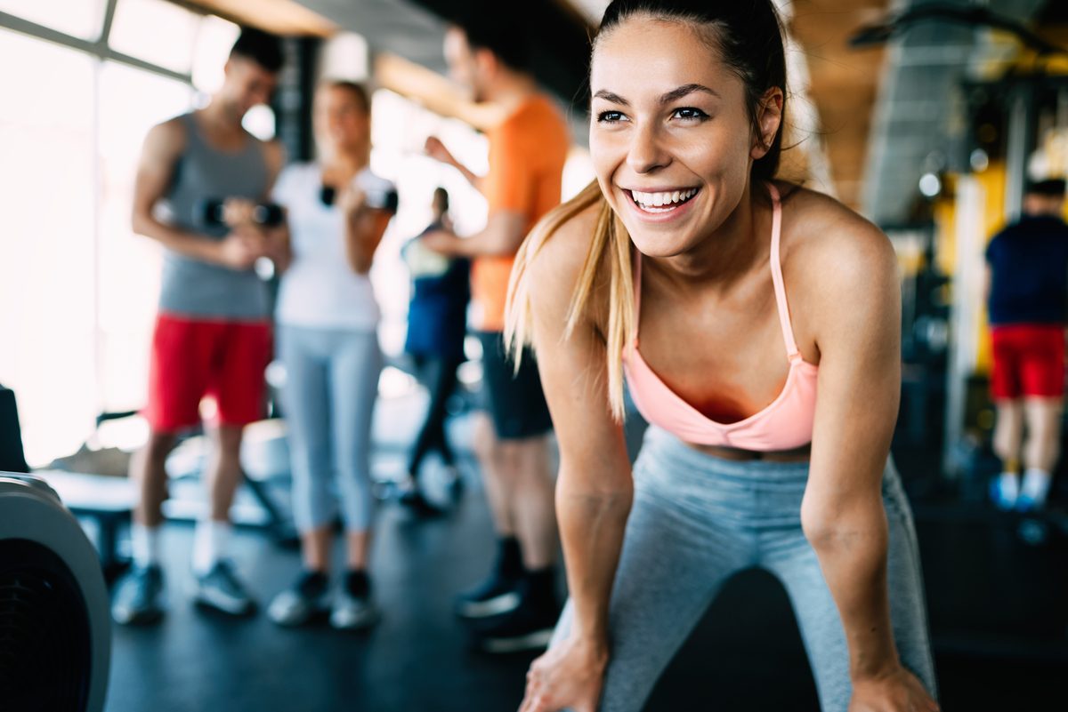 happy woman at gym