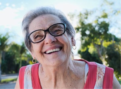 Senior woman smiling.