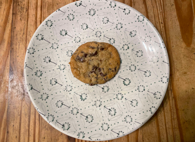 trader joe's cookie on a printed plate. 