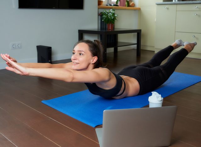 woman doing superman stretch