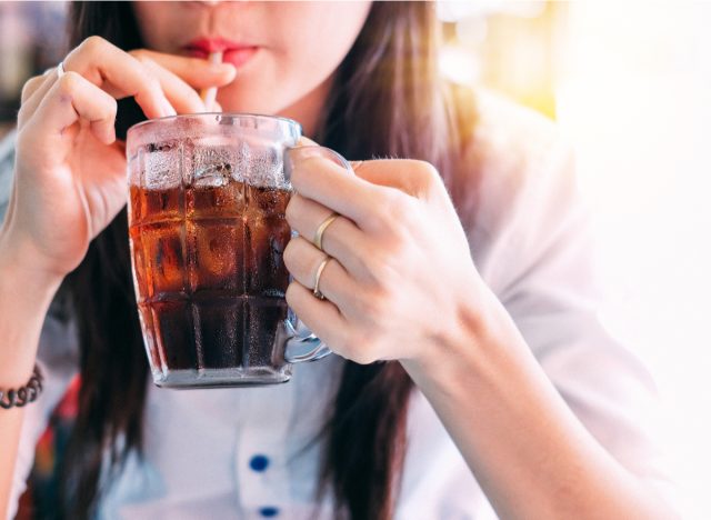 woman drinking soda