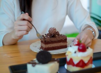 woman eating cake