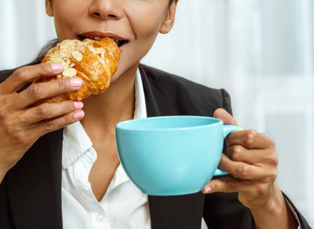 Female eating croissants