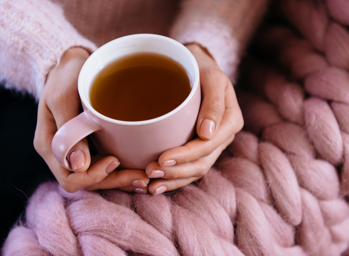 woman holding tea