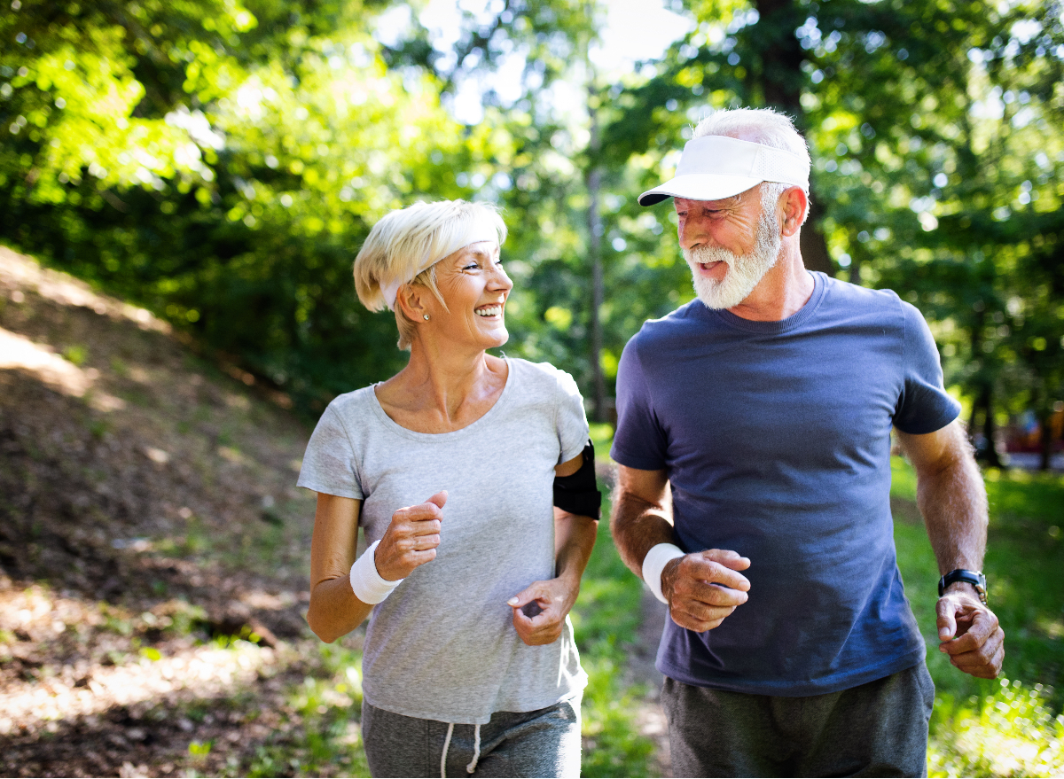 happy older couple running