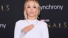 Rita Ora wears white gown at movie premiere