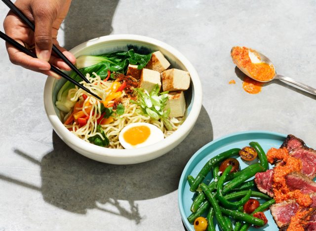 ramen in bowl and steak on plate with green beans from Sunbasket