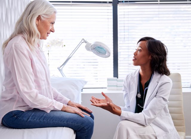 woman having a serious chat with her doctor