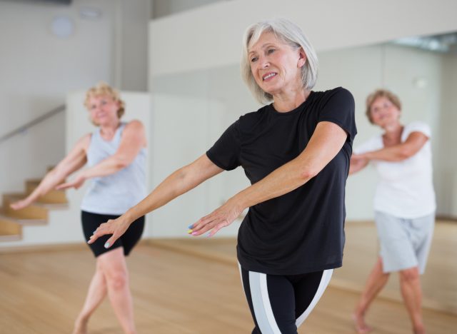 women doing group fitness dance class