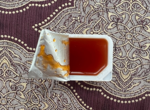 an open container of chick fil-a polynesian sauce 