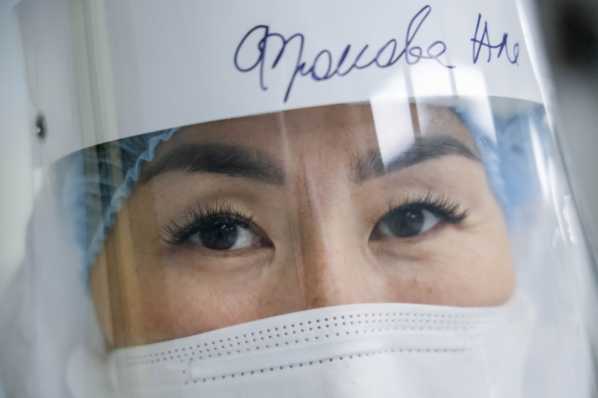 A medical staff member in protective gear at work in the red zone for COVID-19 patients at hospital during the pandemic of the COVID-19 virus.