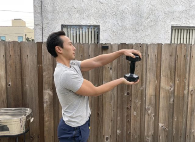 Bus driver with dumbbell