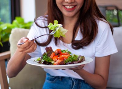 eating salad with salmon