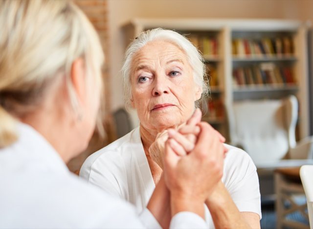 Senior woman in consultation with her female doctor or therapist