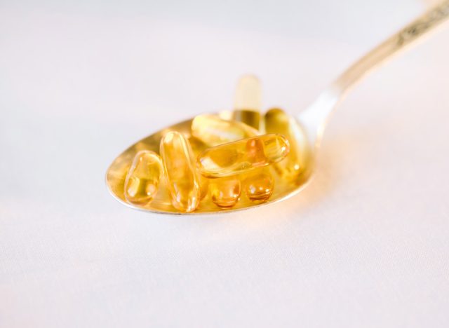 vitamin d supplements on a spoon