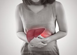 woman holding liver