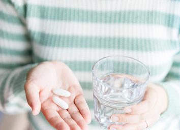 woman taking supplements