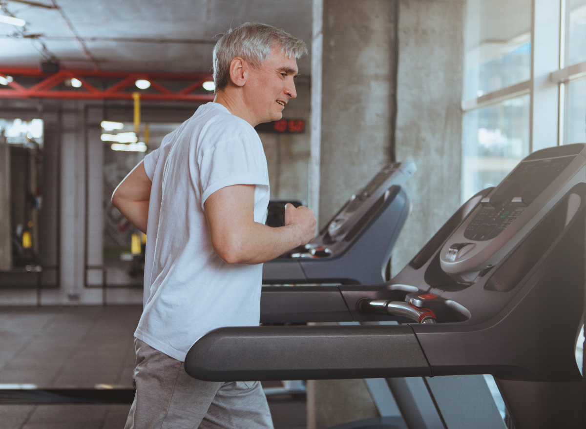 man running on treadmill