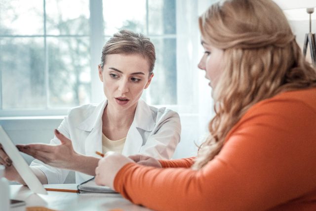woman consulting with female doctor