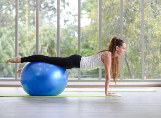 woman doing exercise on stability ball