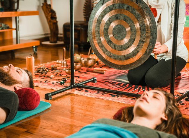 man and woman relaxed at sound bath