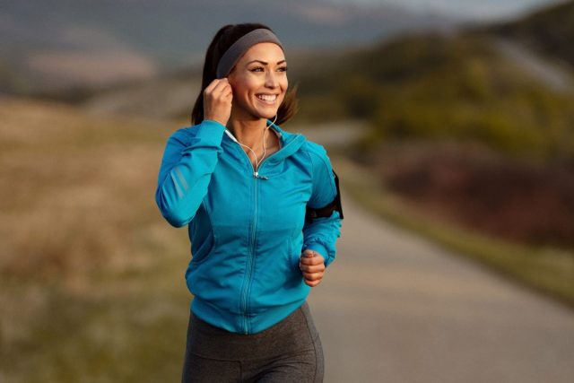 woman jogging along a trail
