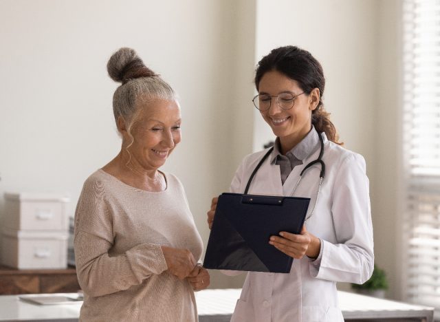 happy doctor with patient