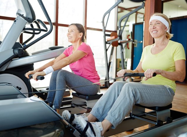 two senior women doing seated row