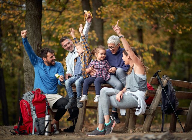 happy family celebrates hiking trip