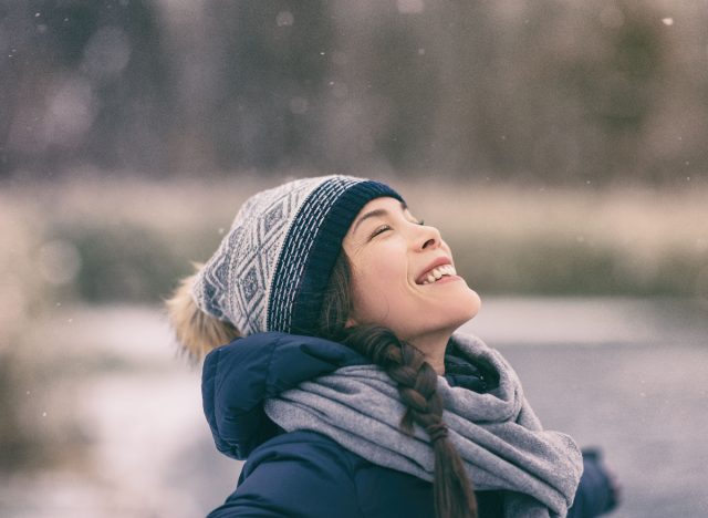 happy woman outside in the winter