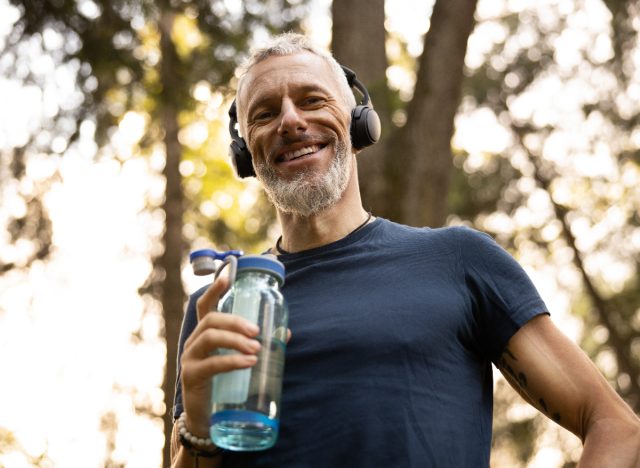 happy active man outdoors in woods