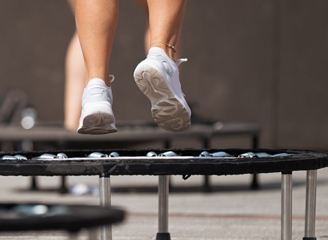 close-up feet on mini trampoline workout
