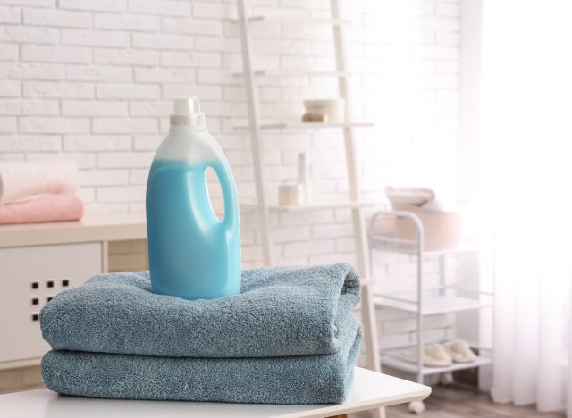 laundry detergent on top of towels