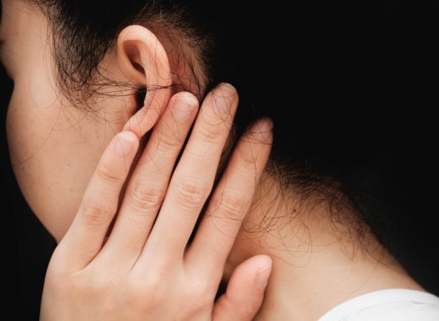 massaging back of ear before sleep
