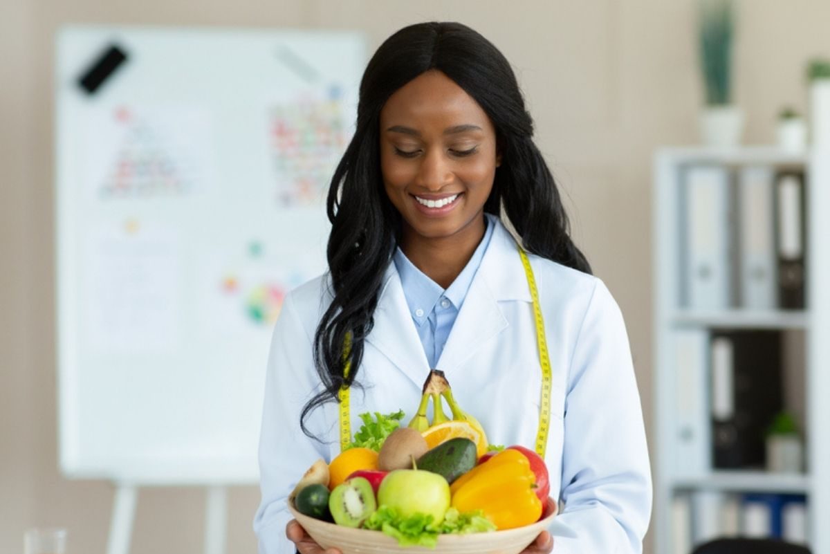 Doctor holding veggies