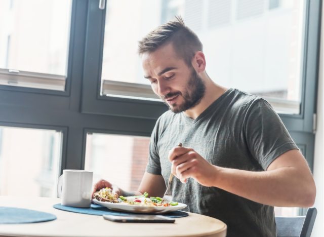 man eating breakfast